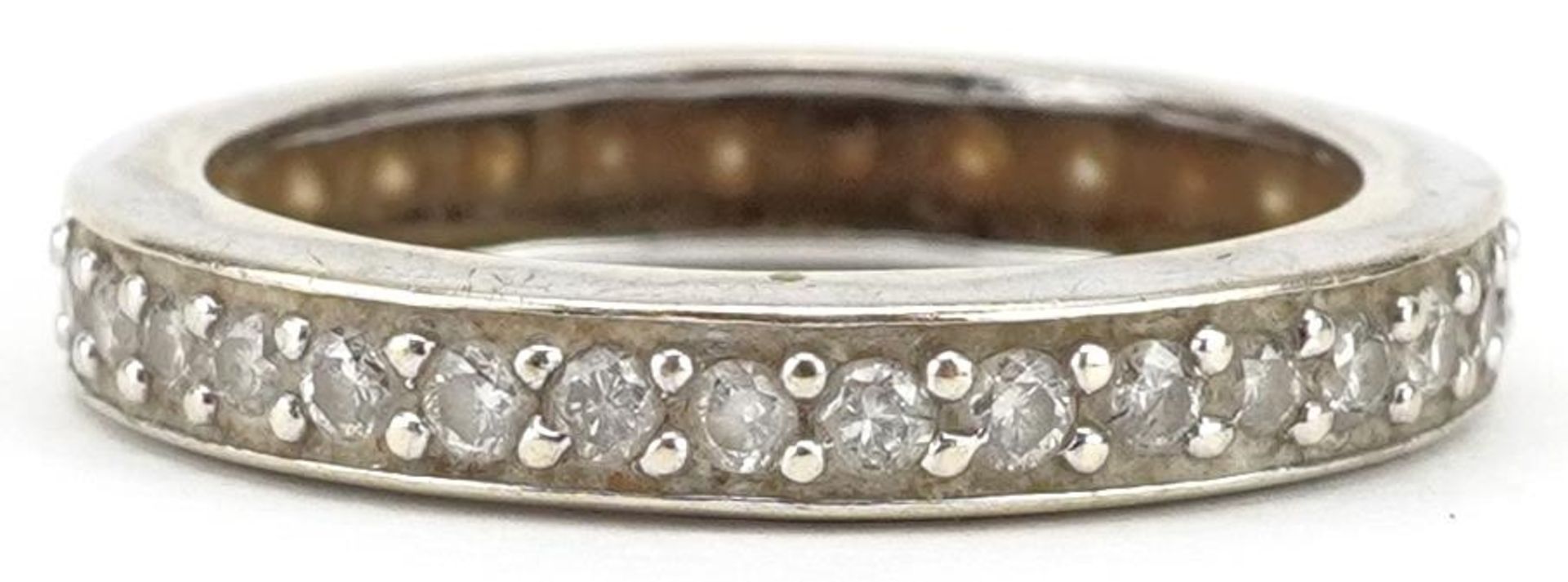 Unmarked white gold diamond eternity ring, each diamond approximately 1.90mm in diameter, size S,