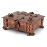 Arts & Crafts beaten copper four footed jewel casket with fitted cushioned interior, 5cm H x 12cm