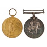 Two British military World War I medals comprising Victory medal awarded to M2-048151PTE.H.J.