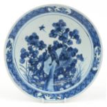 Chinese blue and white porcelain shallow dish hand painted with a bird watching a butterfly