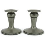 Pair of Arts & Crafts tudric pewter candlesticks numbered 01542 to the bases, each 11cm high : For