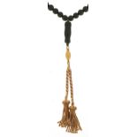 Antique bloodstone bead necklace with unmarked gold tassel drops, tests as 9ct gold, the necklace