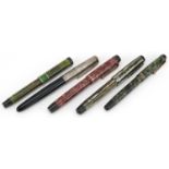 Five vintage Parker fountain pens, four marbleised, including Duofold, Lucky Curve and 51 with