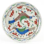 Turkish Ottoman Iznik pottery plate hand painted with two stylised birds amongst flowers, 30cm in