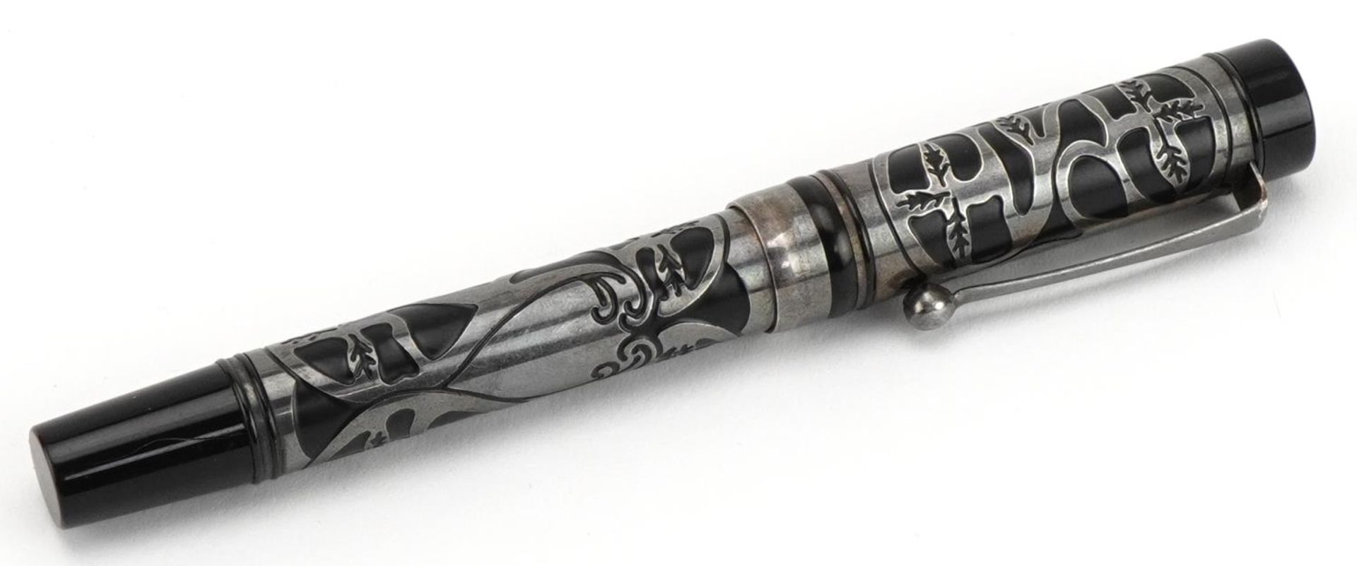 Fountain pen with unmarked silver foliate overlay and white metal clip : For further information