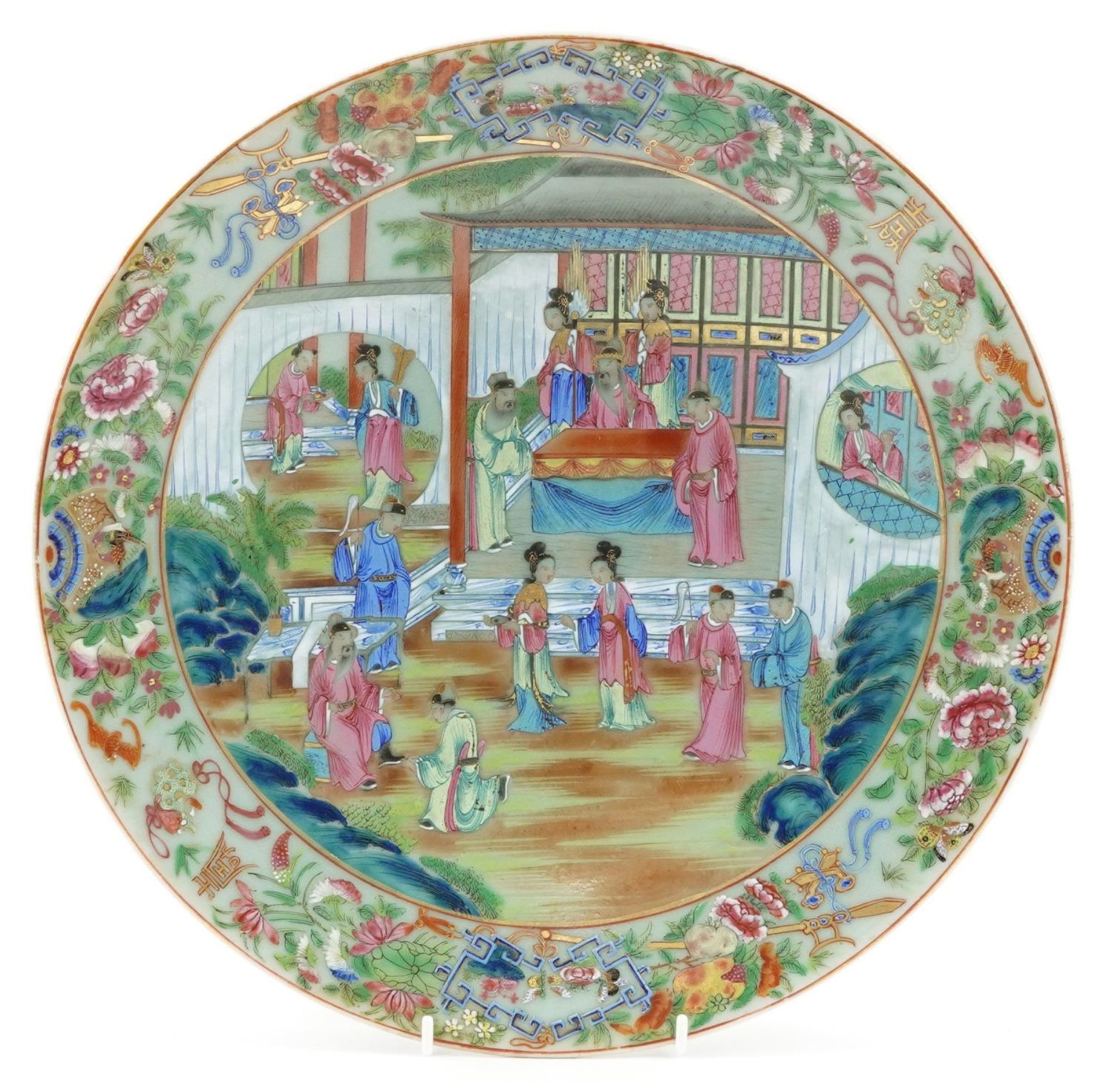 Chinese Canton porcelain celadon ground charger hand painted in the famille rose palette with an