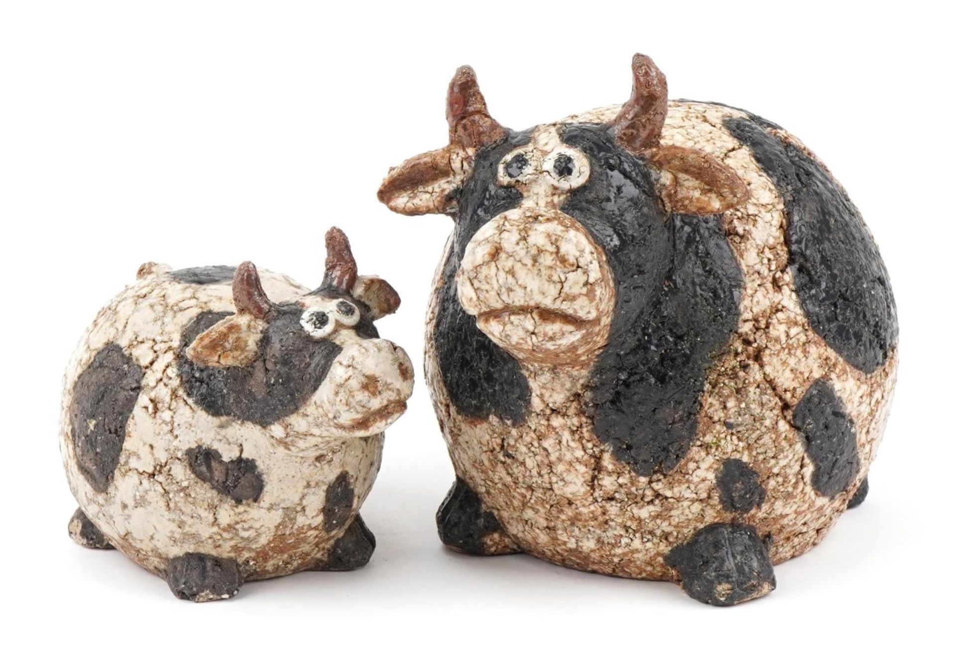 Athezza, graduated pair of mid century style pottery cows, the largest 21cm high : For further