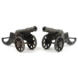 Pair of naval interest 19th century style bronze and cast iron table cannons, each 47cm in