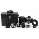 Pentacon Six TL camera with lenses, accessories and carry case including two Carl Zeiss lenses