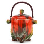 Clarice Cliff, Art Deco My Garden pattern biscuit barrel and cover with swing handle, 20cm high