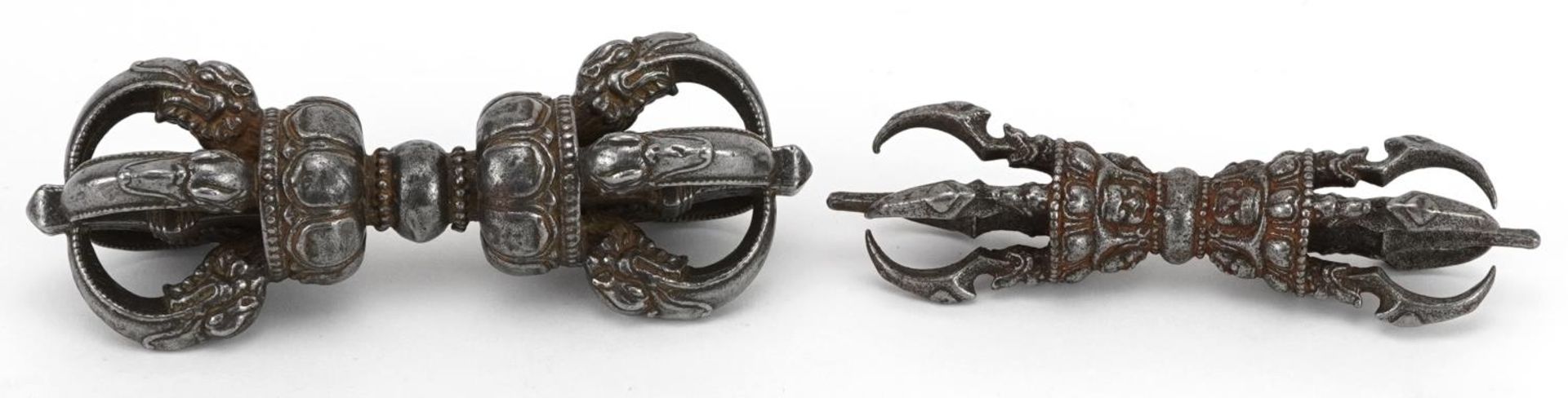 Two Tibetan cast white metal dorjes, the largest 13cm wide : For further information on this lot