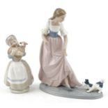 Two Nao figure groups including one of a girl with puppy, the largest 30cm high : For further