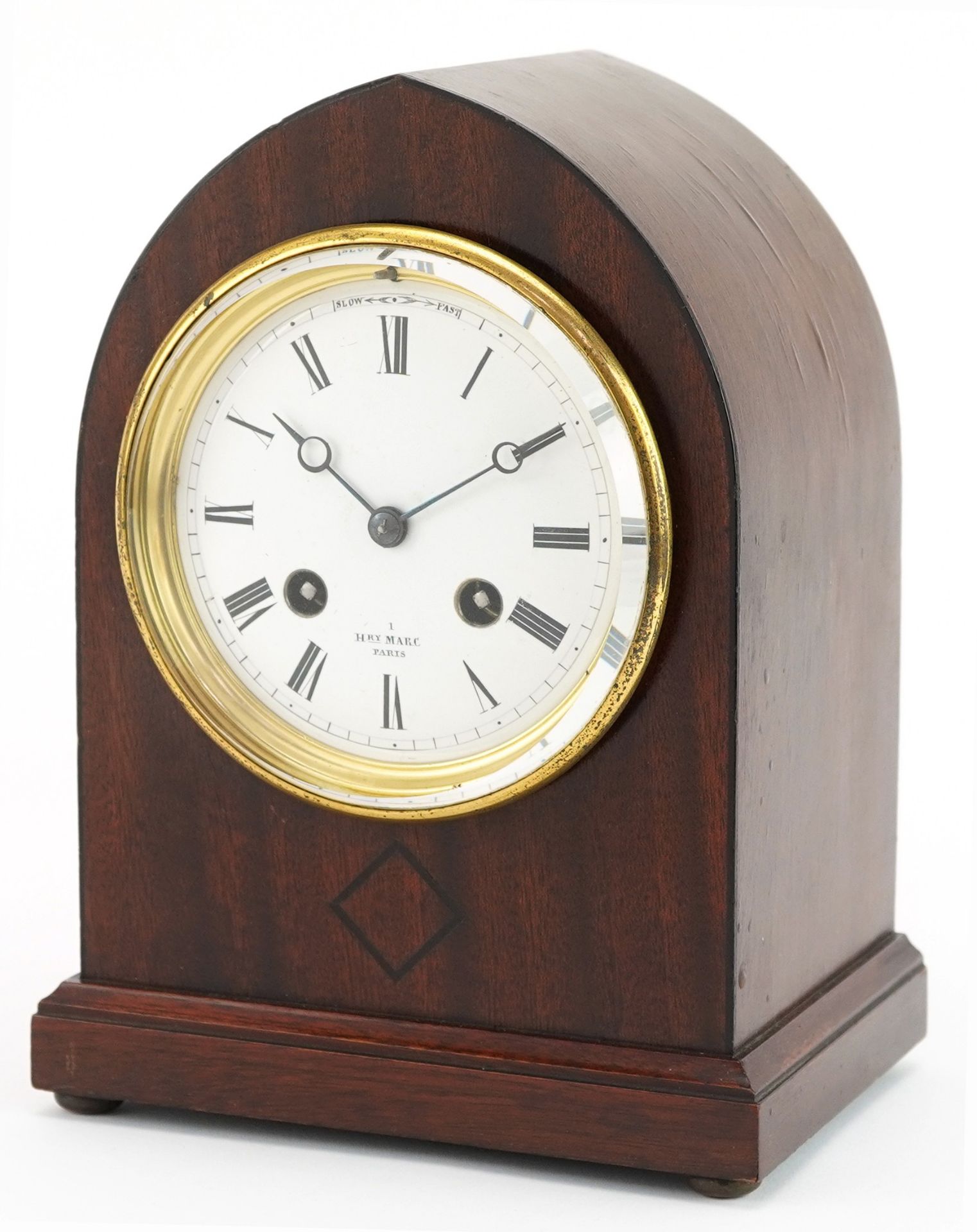 Henri Marc of Paris, Gothic style arch top mahogany mantle clock with circular enamelled dial having