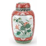 Chinese porcelain iron red ground ginger jar with cover hand painted in the famille verte palette