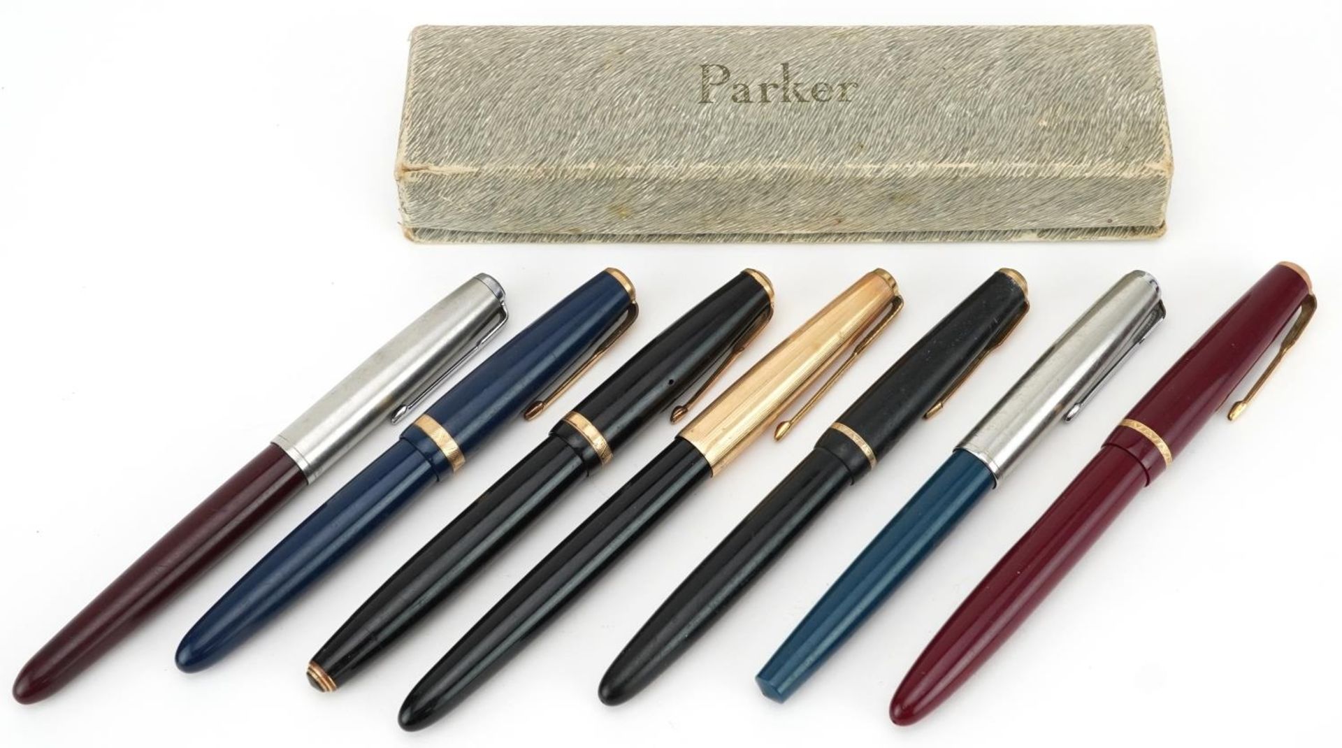 Seven vintage Parker fountain pens, some with gold nibs, one with box, including Duofold, Senior