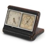 Early 20th century chrome plated eight day desk clock with barometer housed in a leather case, 7cm x