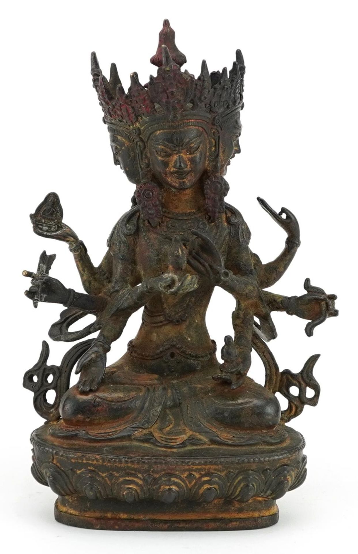 Chino Tibetan partially gilt bronze figure of three faced Buddha, 21.5cm high : For further