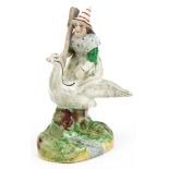 Victorian Staffordshire pottery figure of Mother Goose, 18.5cm high : For further information on
