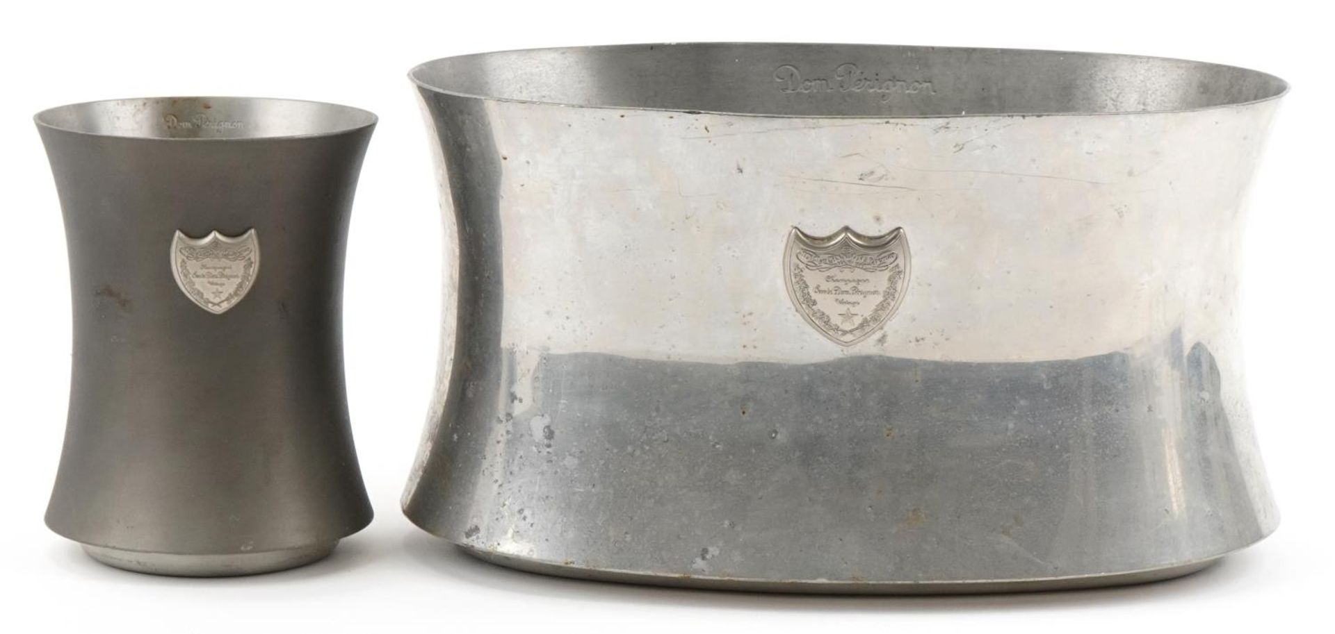 Two vintage French pewter Dom Perignon ice buckets designed by Martin Szekely, the largest 39cm wide