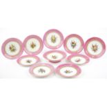 Royal Worcester, Victorian pink ground Botanical dessert service hand painted with various flowrs