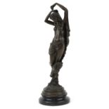 19th century style classical patinated bronze statuette of a semi nude female with child raised on a