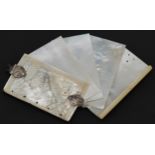 19th century mother of pearl aide memoire with unmarked silver mounts carved with a huntsman and