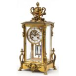 19th century French ormolu four glass mantle clock striking on a bell with visible Brocot escapement