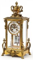 19th century French ormolu four glass mantle clock striking on a bell with visible Brocot escapement