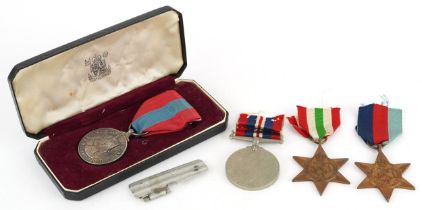 Two British military World War II medals and Elizabeth II Imperial Service medal awarded to