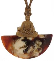 Tibetan hardstone pendant mounted with a Buddha on a gilt metal necklace, the pendant 5.5cm high :