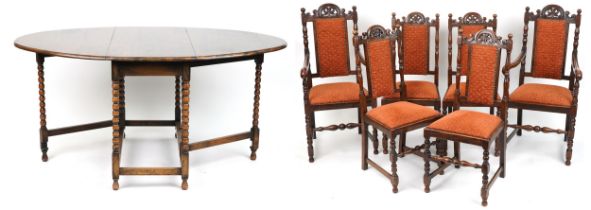 Victorian oak drop leaf dining table with bobbin turned legs and set of six carved oak dining chairs