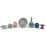 Studio pottery including a bottle vase and a bowl, various marks, the largest 22cm high : For