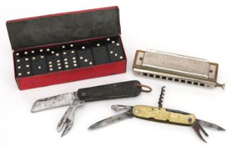 Sundry items including a folding pocket knife, M Hohner harmonica and Star Cigarettes advertising