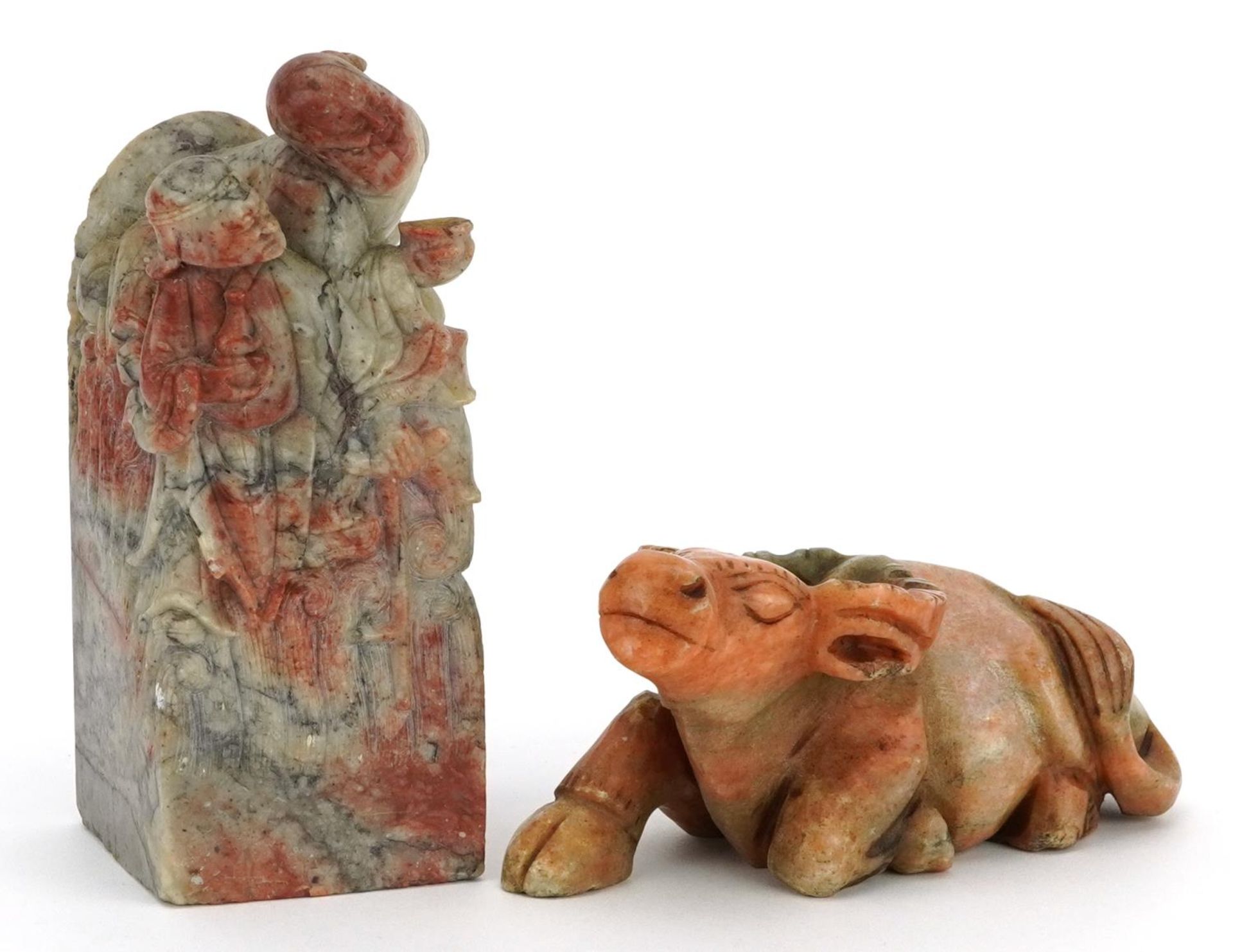 Chinese soapstone carvings including a large square seal carved with two elders, the largest 15cm