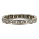 Unmarked white metal diamond eternity ring, size M/N, 2.2g : For further information on this lot