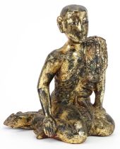 Thai gilt carved wood seated figure of a robed monk, 31cm high : For further information on this lot