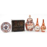 Japanese ceramics and woodenware including an Imari vase, Imari plate, Satsuma vases and a wooden