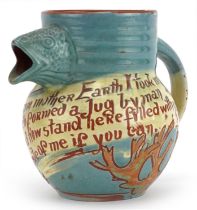C H Brannam, Arts & Crafts jug with fish spout and incised motto, 14.5cm high : For further