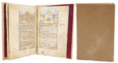 Two 18th century or earlier Islamic illuminated hand painted prayer books, later bound, each 20.