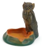 Danish pottery ashtray surmounted with an owl, impressed factory marks and numbered 142 to the base,