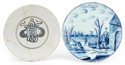 17th century Delft tin glazed armorial plate and a blue and white Delft Month of the Year plate