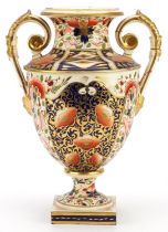 Davenport, early 19th century twin handled vase hand painted in the Imari palette, 29cm high : For