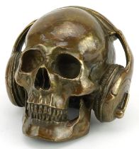 Novelty patinated bronze human skull with headphones, 16cm high : For further information on this