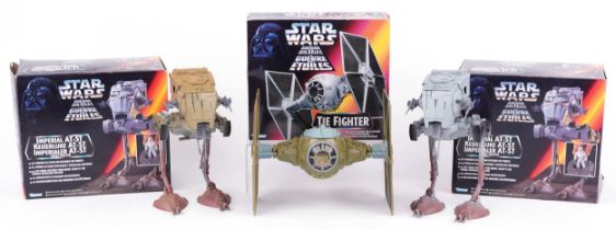 Three French Star Wars models with boxes by Kenner comprising two Imperial AT-ST and Tie Fighter :