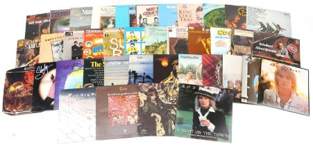 Vinyl LP records including Rod Stewart, Bonnie Tyler, Gerry and the Pacemakers, Nat King Cole and