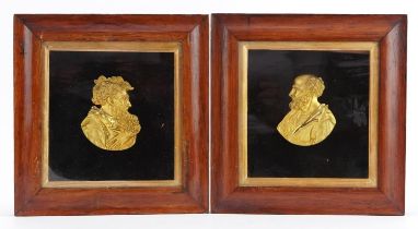 Pair of gilt cast metal profile portrait plaques, each housed in a glazed rosewood frame, each