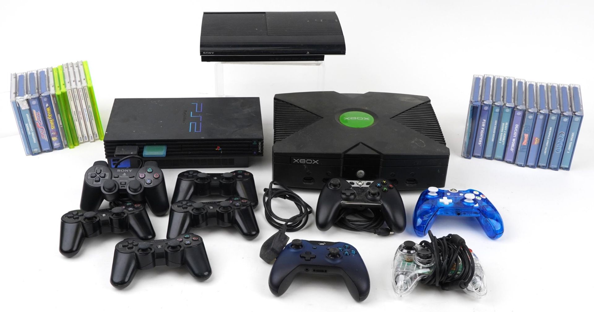 Three games consoles, games and controllers comprising Xbox, Sony PlayStation 2, Sony PlayStation