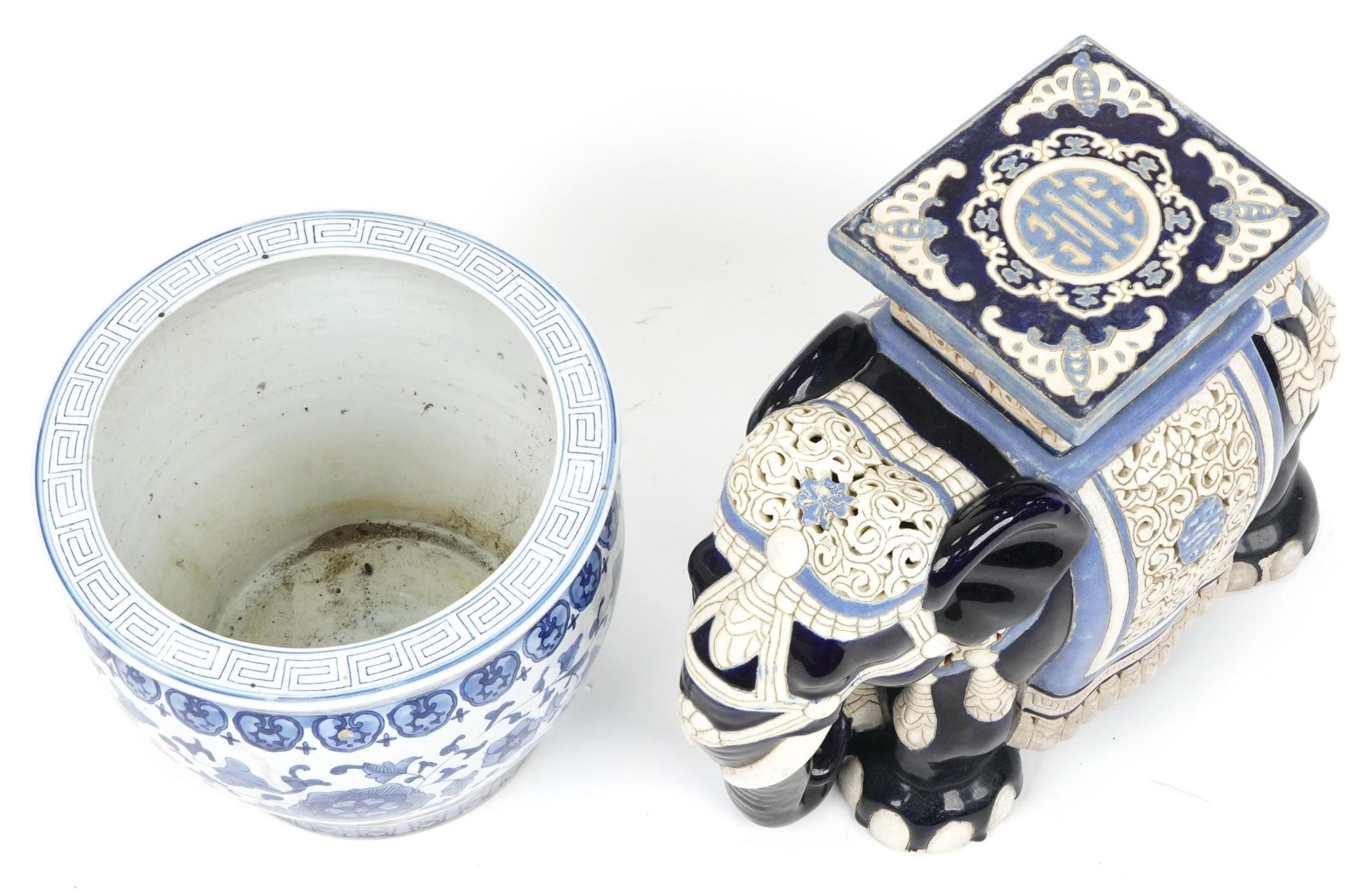 Chinese porcelain garden seat in the form of an elephant and blue and white jardiniere decorated - Image 2 of 4