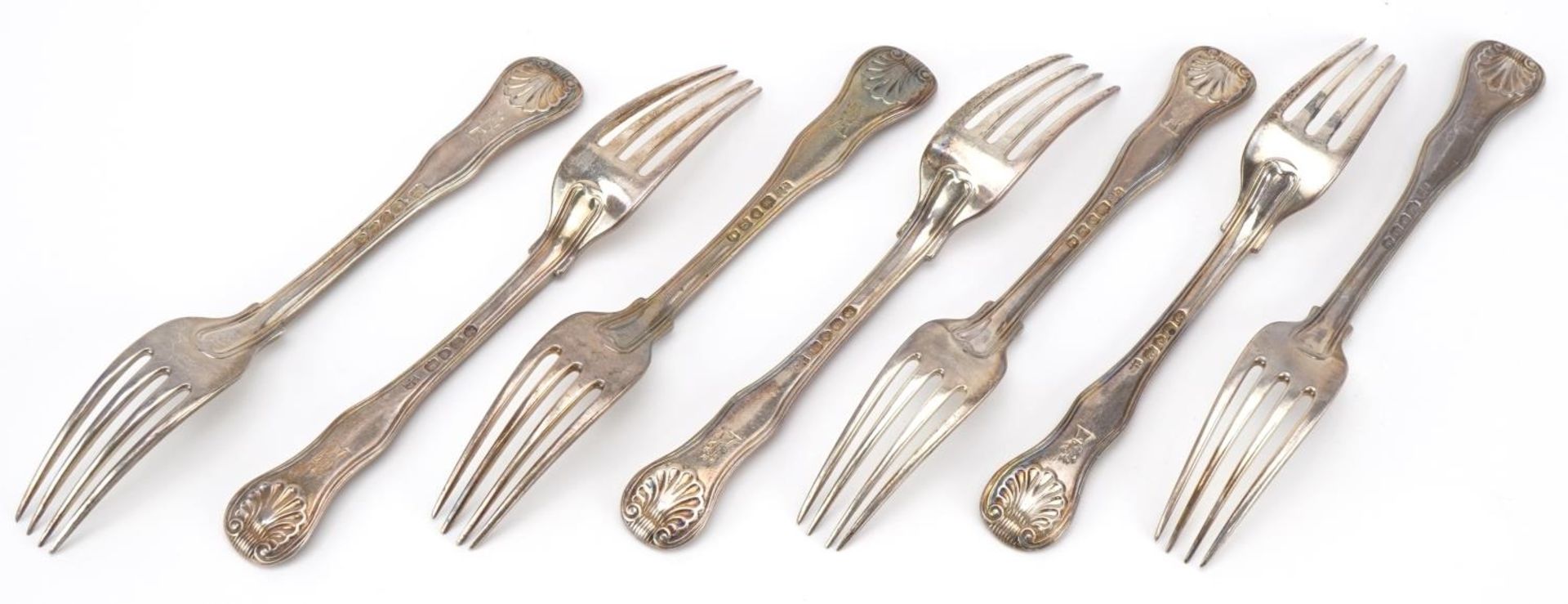 Morris & Michael Emmanuel, seven George IV matching silver forks, London 1828, 17.5cm in length, - Bild 2 aus 3