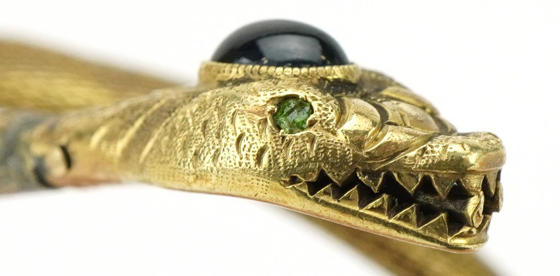 Antique 14ct gold serpent bangle set with a cabochon sapphire and emerald eyes, the head stamped - Image 2 of 4